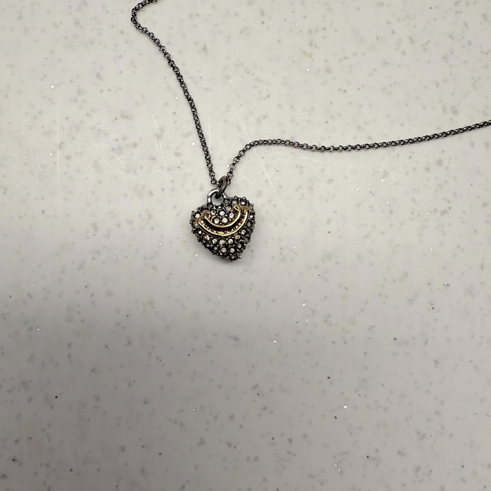 Juicy couture necklace. Silver color